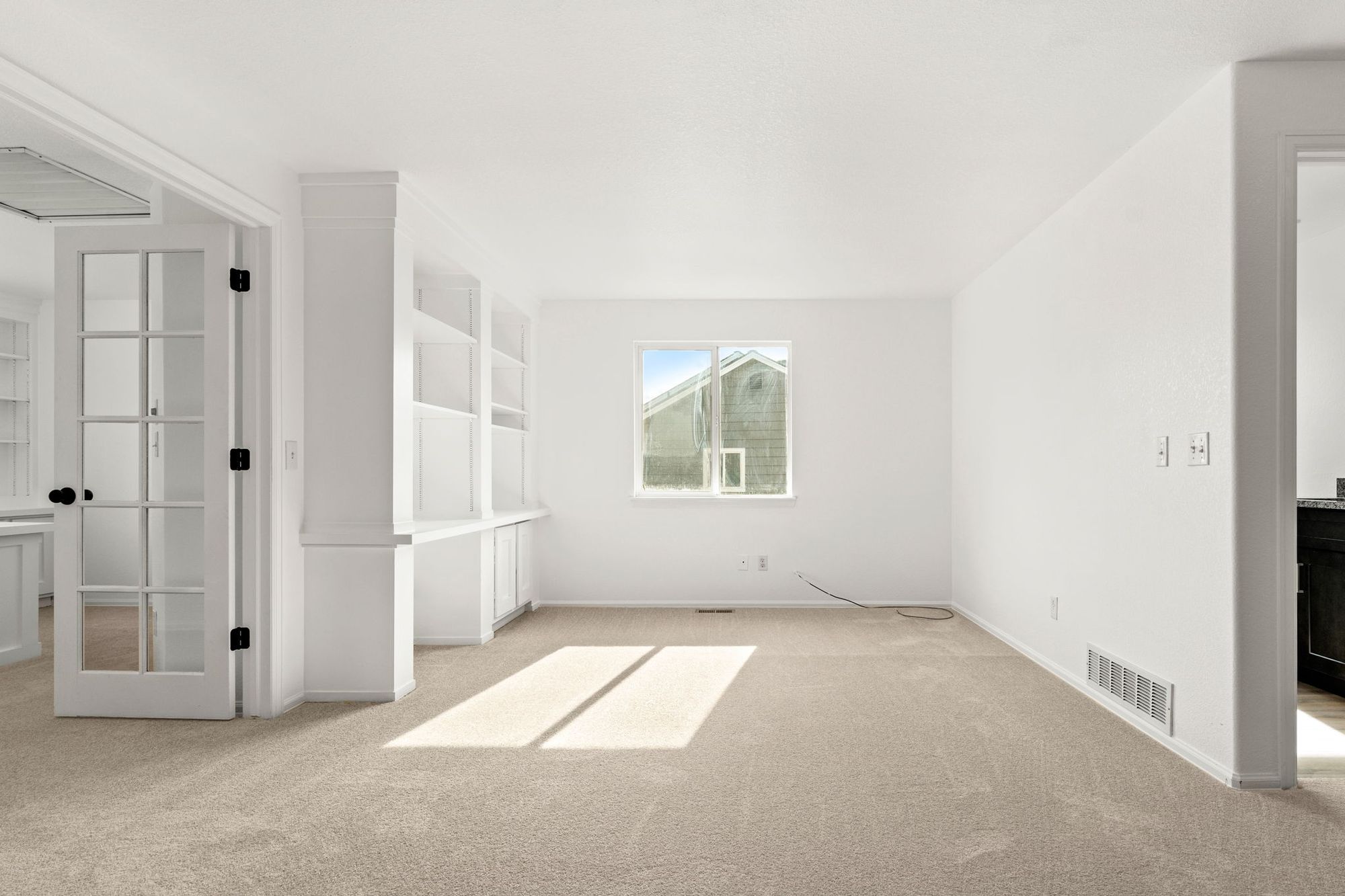 Living room in Parker, Colorado, with new wall to wall carpet