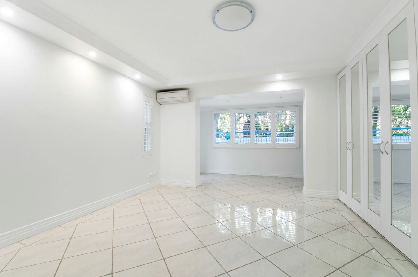 Large format polished tile flooring