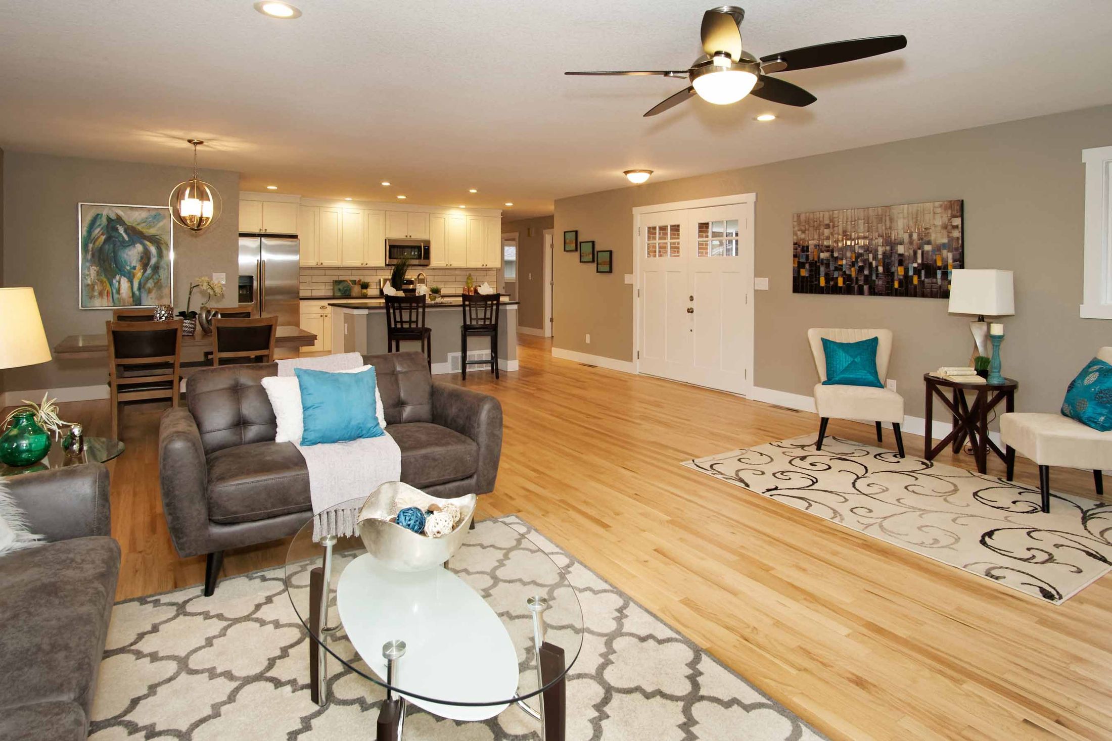 Open living area in Littleton with white oak hardwood