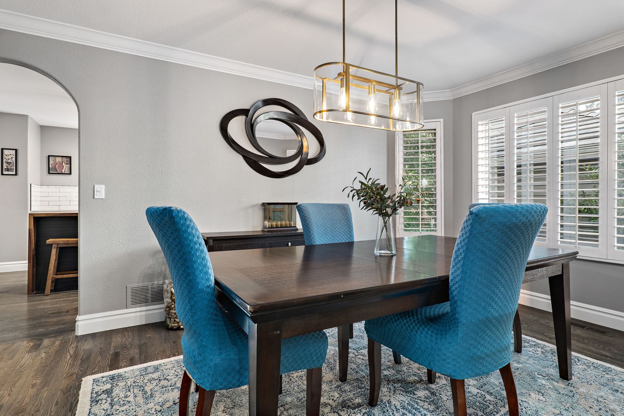 The same Highlands Ranch dining room after the new hardwood floor