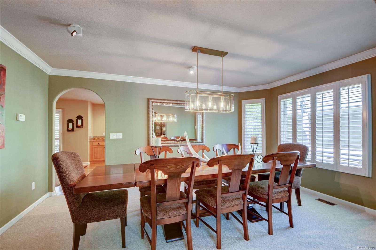 Dining room in Highlands Ranch before the new hardwood floor