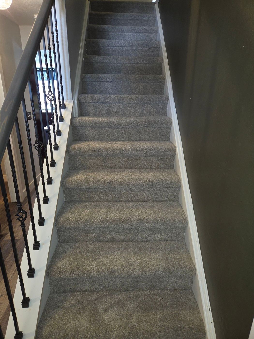 Staircase in Littleton with new carpet and rail
