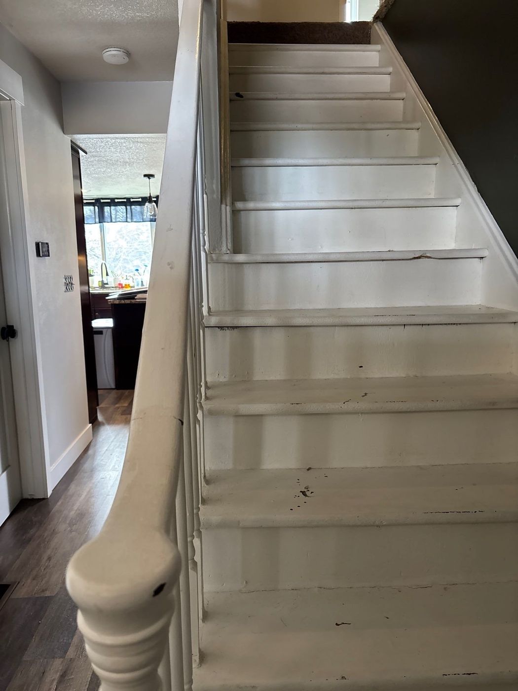 The same staircase before, with painted treads