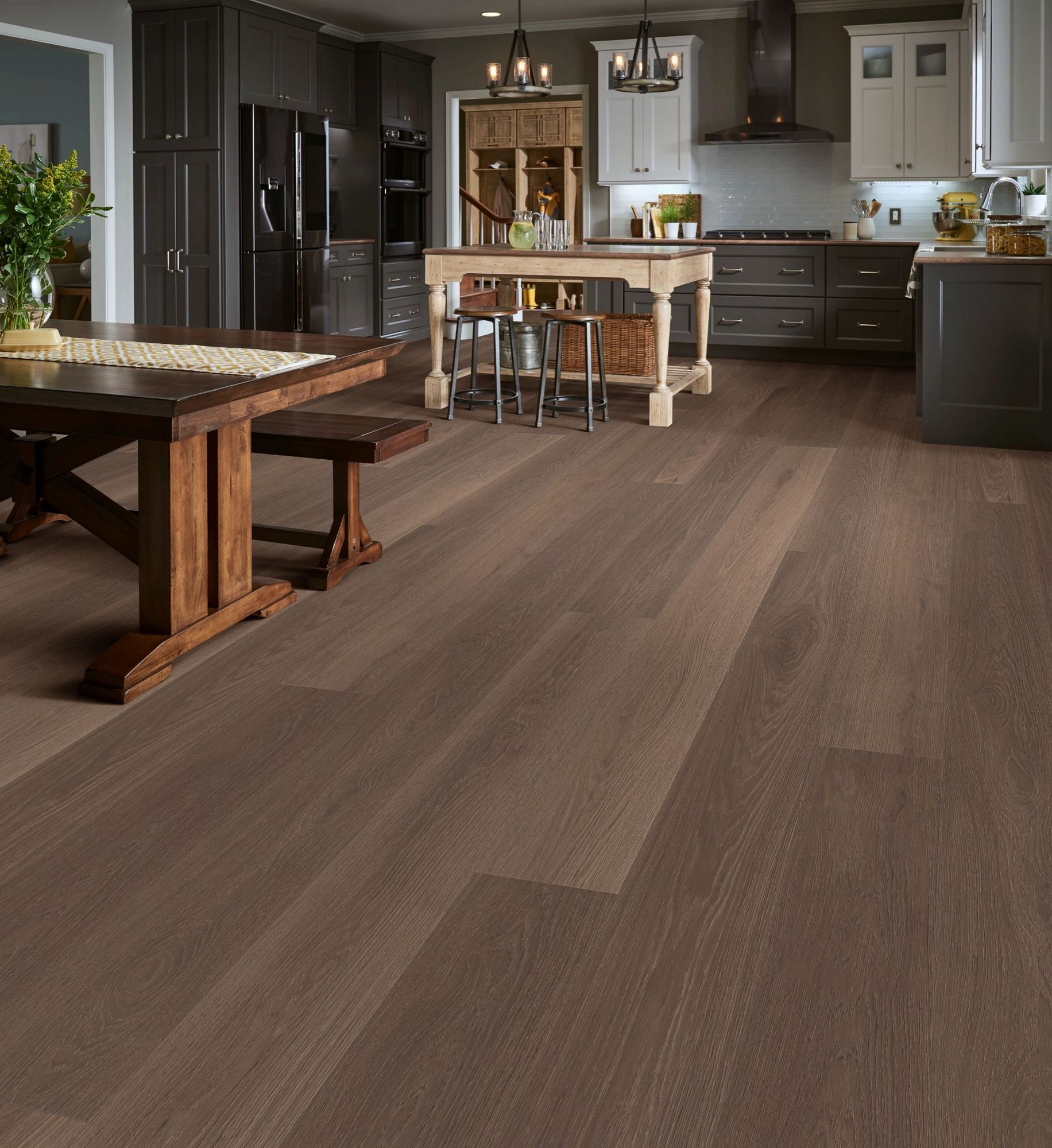 Kitchen and dining area with luxury vinyl plank in South Denver