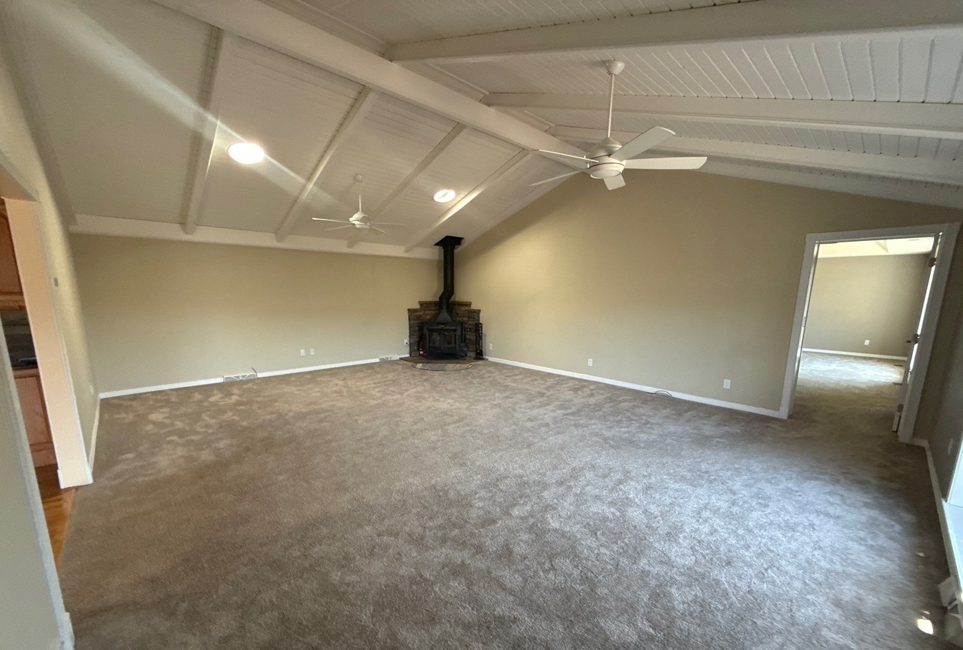 Vaulted living room in Sedalia with new carpet