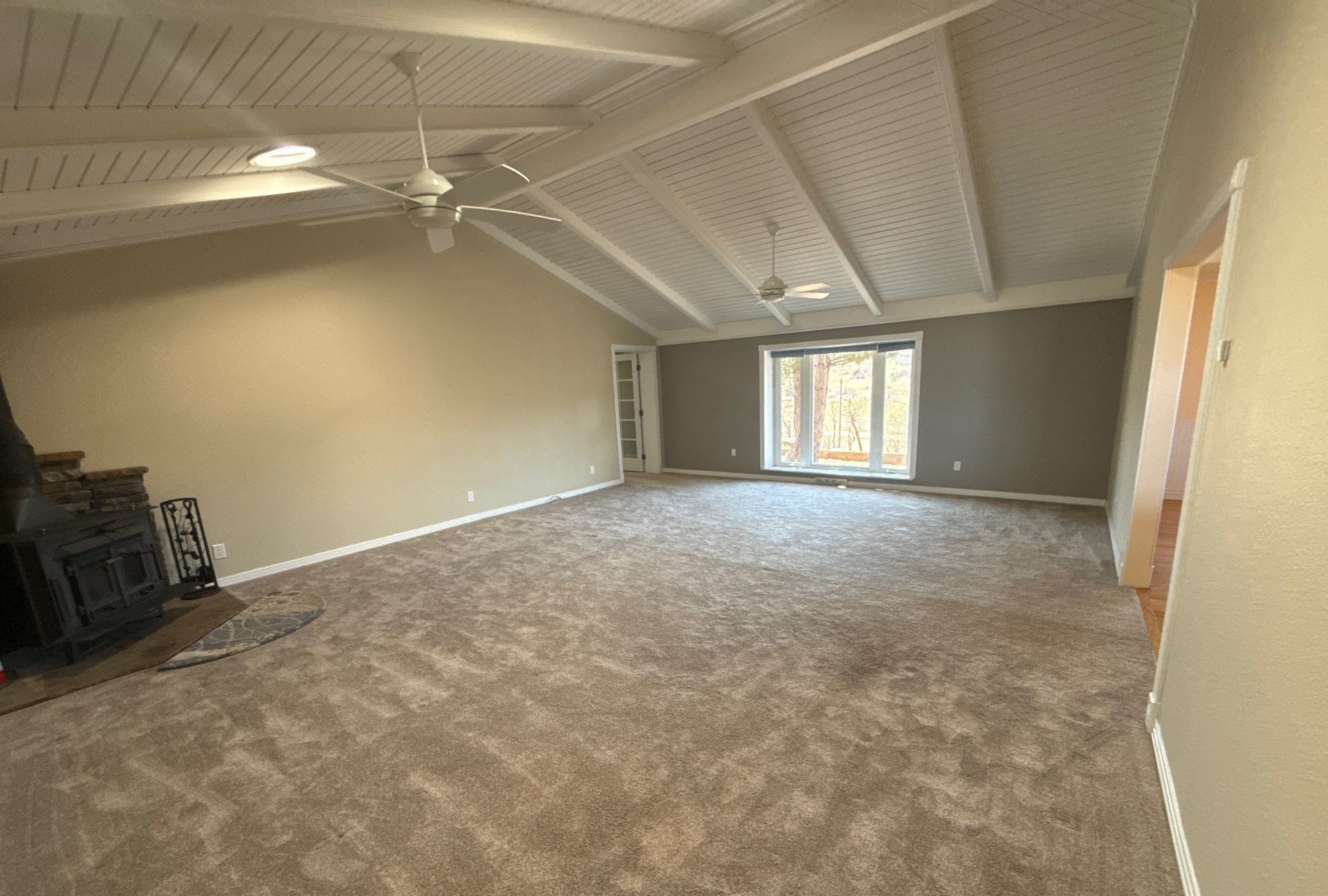 Vaulted living room in Sedalia with new carpet